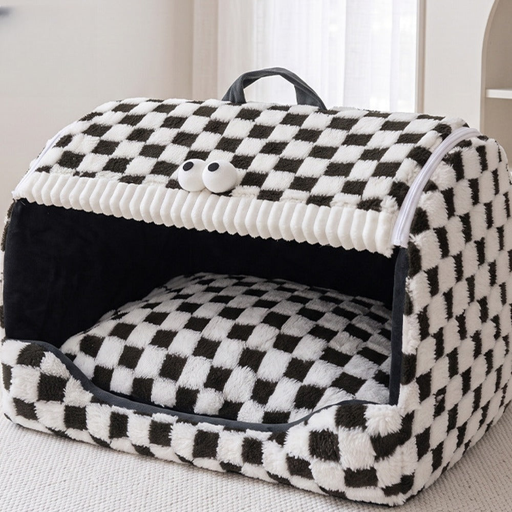 Black and white checker plush pet house with googly eyes and carry handle