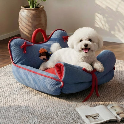 Pet sofa bed with red quilted comforter