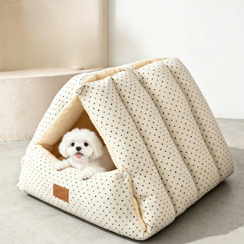 Cream polka dot corduroy cat tent bed with a small white dog peeking out