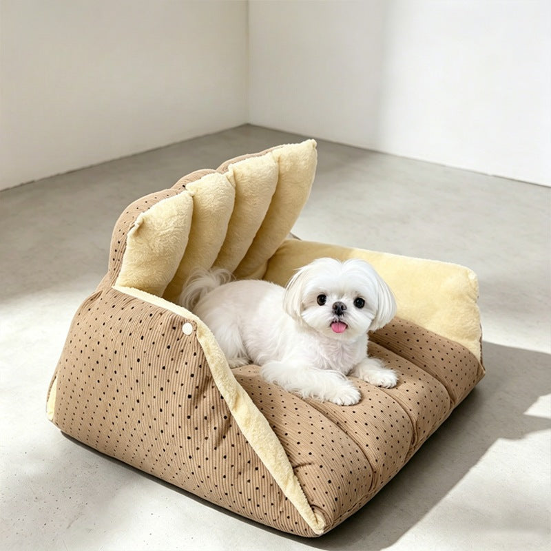 Cat tent unsnapped and folded flat into an open pet bed with headrest