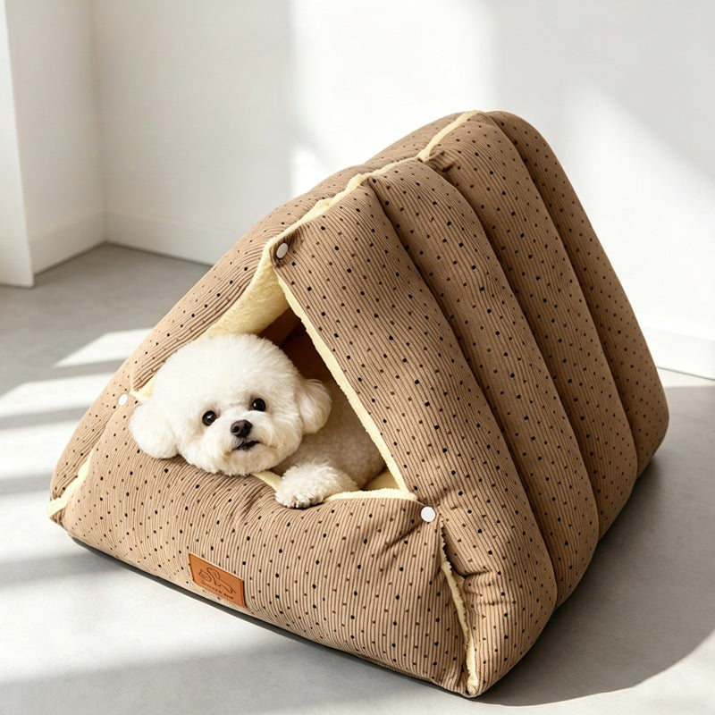 Mocha polka dot triangle pet cave with a puppy resting inside