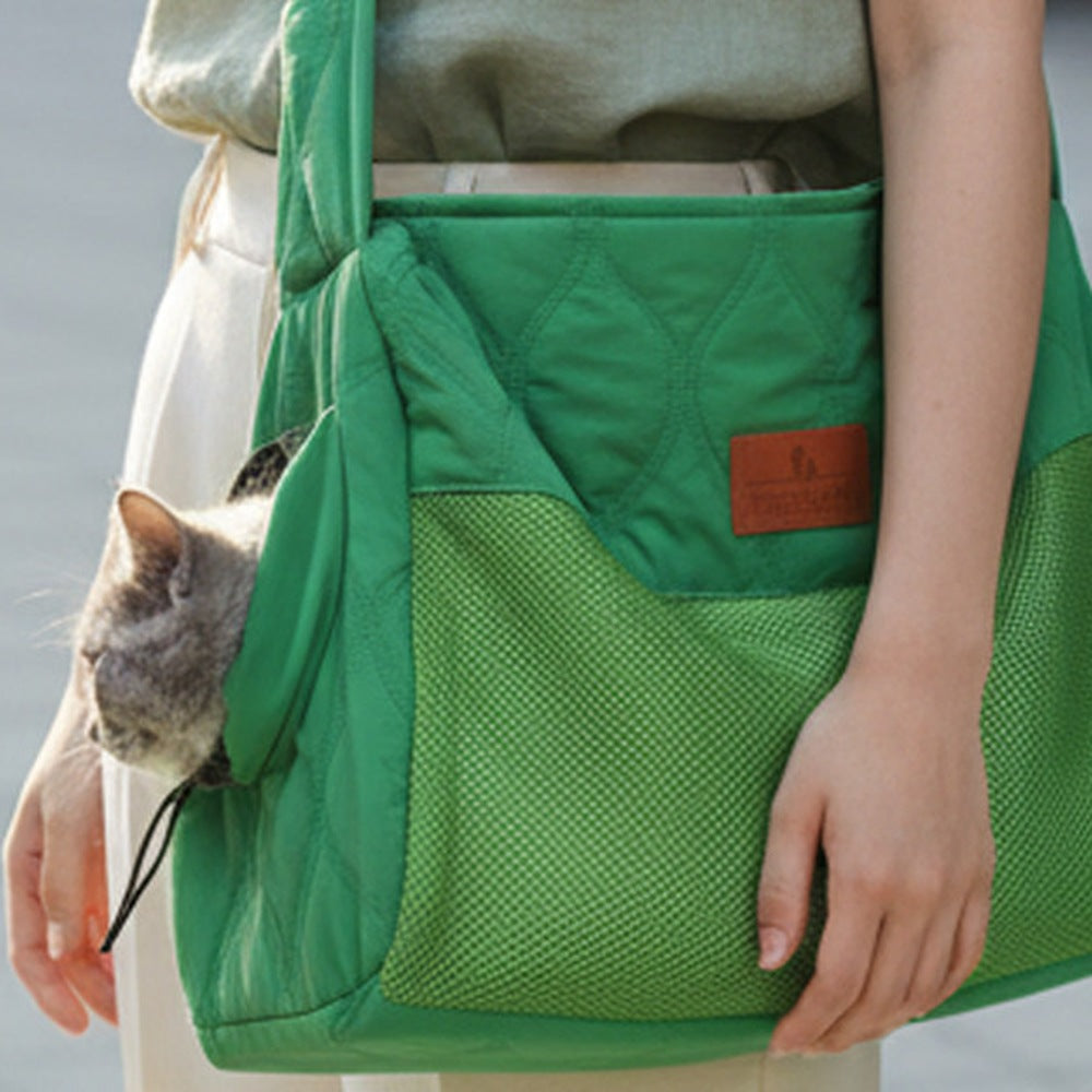 Breathable mesh side of green cat carrier