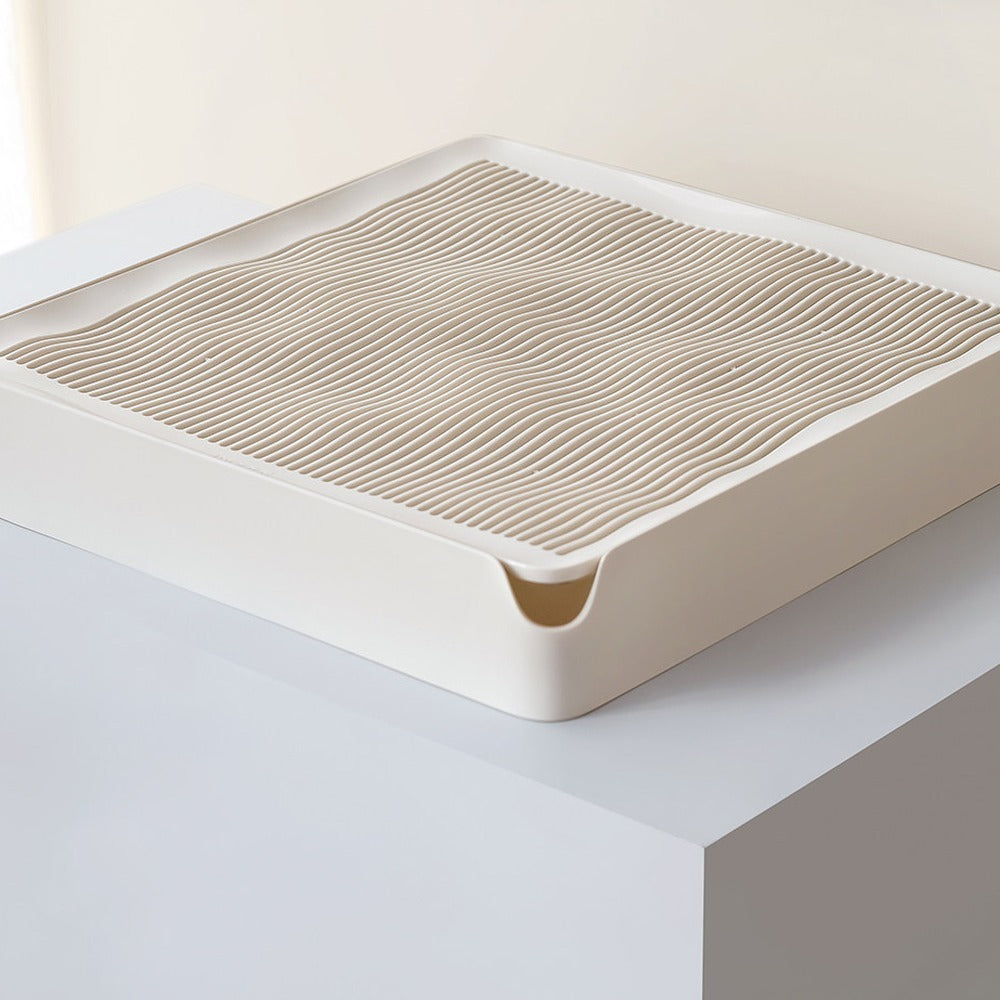Low 8 cm litter trapping tray with a lift-off grate