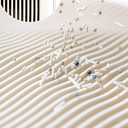 Wave-shaped ridges shake litter loose from paws