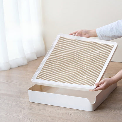 Diagonal finger grooves lift the grate off the tray
