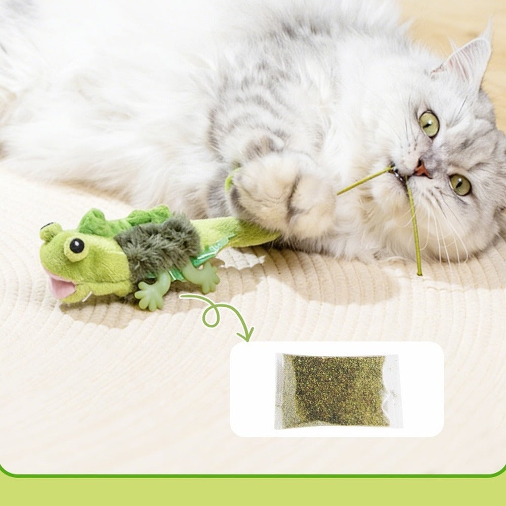 Cat playing with the lizard toy that has catnip inside its head