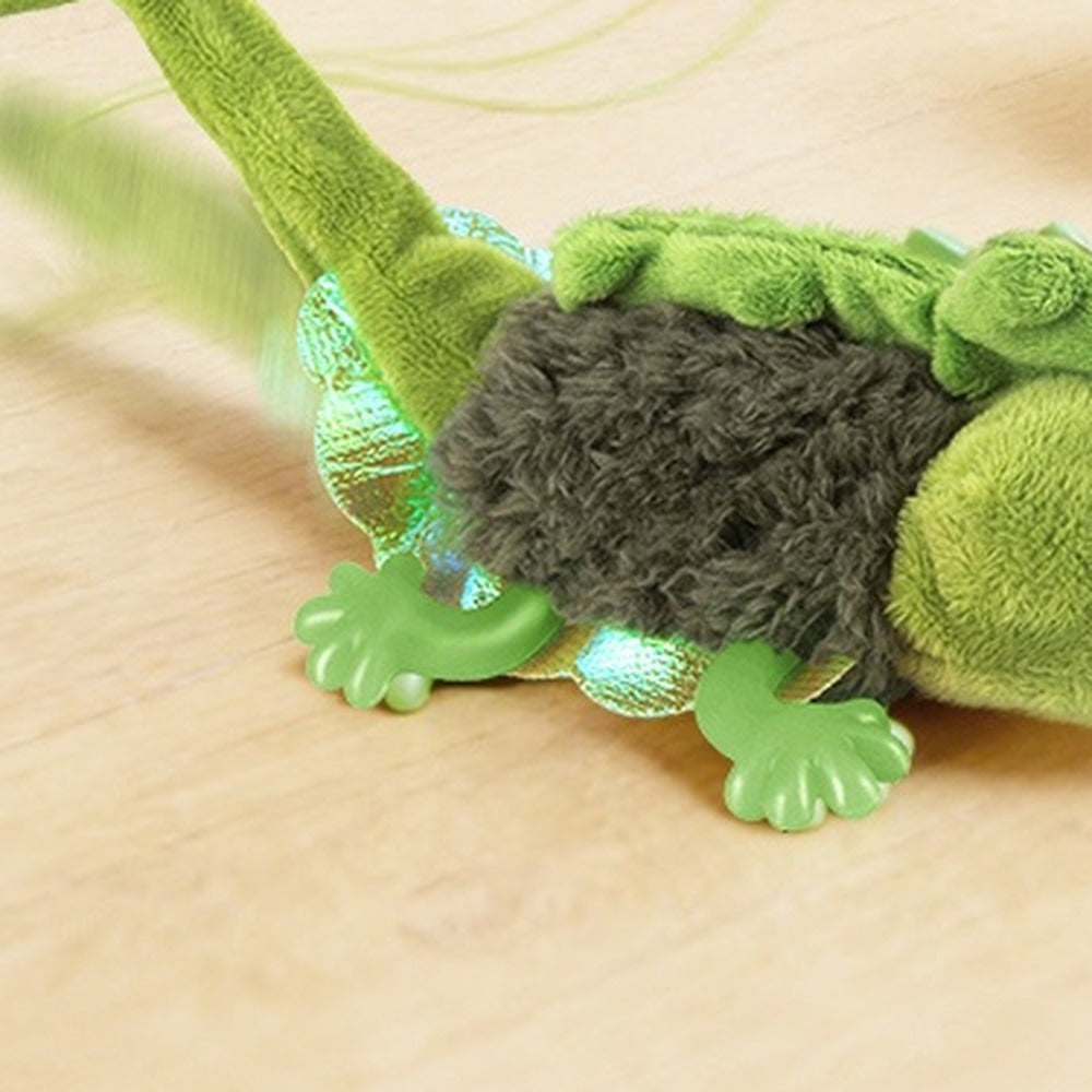 Green plush interactive lizard cat toy with wiggling tail