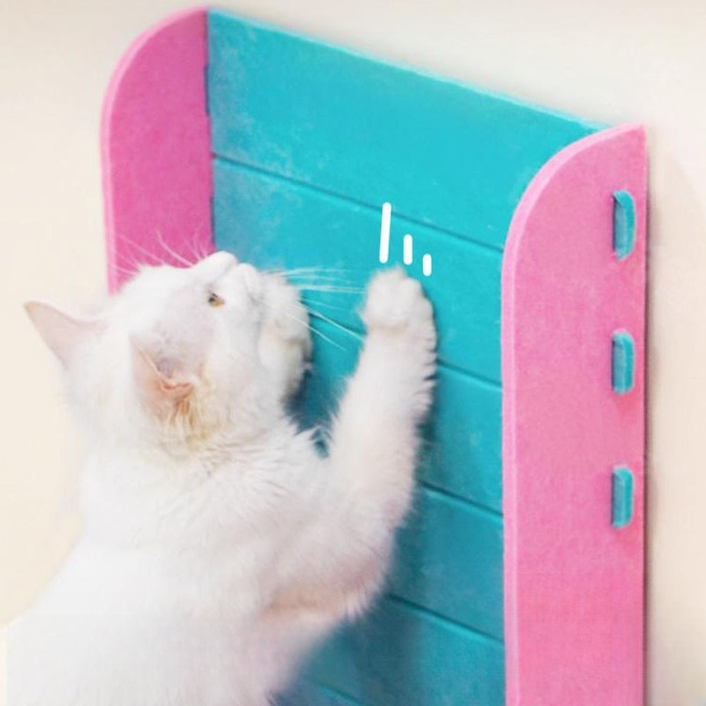Cat stretching up to scratch the felt panel