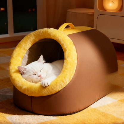 Cat sleeping in a brown plush cat cave bed