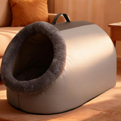 Gray plush cat cave bed with charcoal faux-fur rim