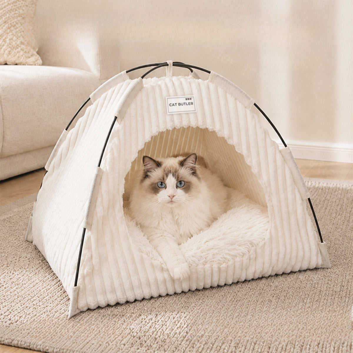 Cream plush cat tent bed with a ragdoll cat inside