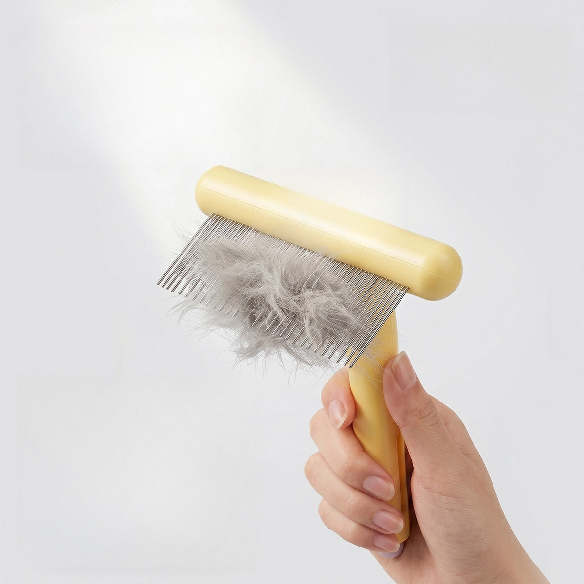 Rake comb lifting loose undercoat fur